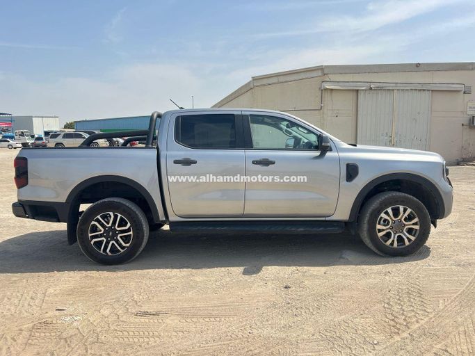 Подержанный Ford Ranger T6.2, 3.0 л, 2024 в Дубае от Alhamd Motors Серебристый цвет. Other | AUTO.AE