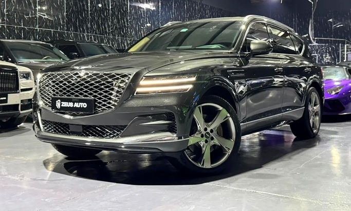 Used Genesis GV80 I, 3.5 l, 2024 in Dubai by Zeus Motors, Brown color. GCC Specs | AUTO.AE