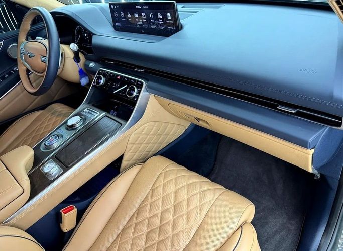 Used Genesis GV80 I, 3.5 l, 2024 in Dubai by Zeus Motors, Brown color. GCC Specs | AUTO.AE