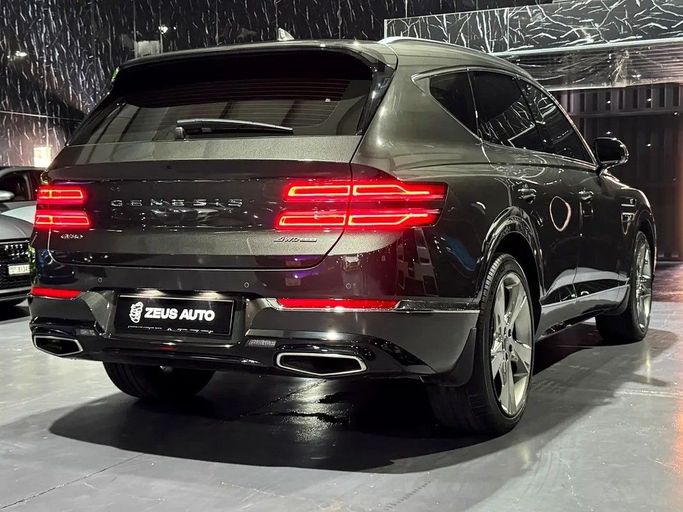 Used Genesis GV80 I, 3.5 l, 2024 in Dubai by Zeus Motors, Brown color. GCC Specs | AUTO.AE