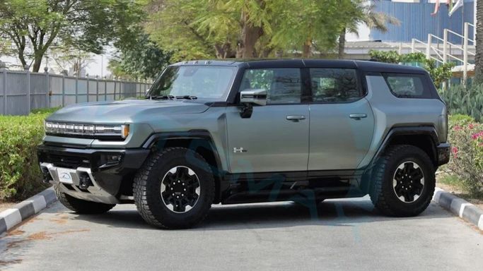 New GMC Hummer EV, 2024 in Dubai by Auto Max Group, Green color.  | AUTO.AE