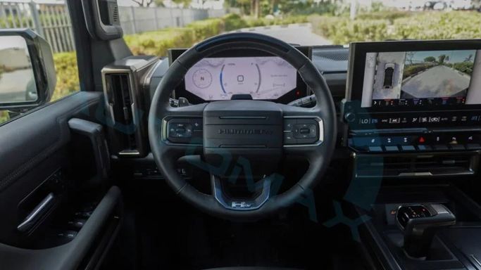 New GMC Hummer EV, 2024 in Dubai by Auto Max Group, Green color.  | AUTO.AE