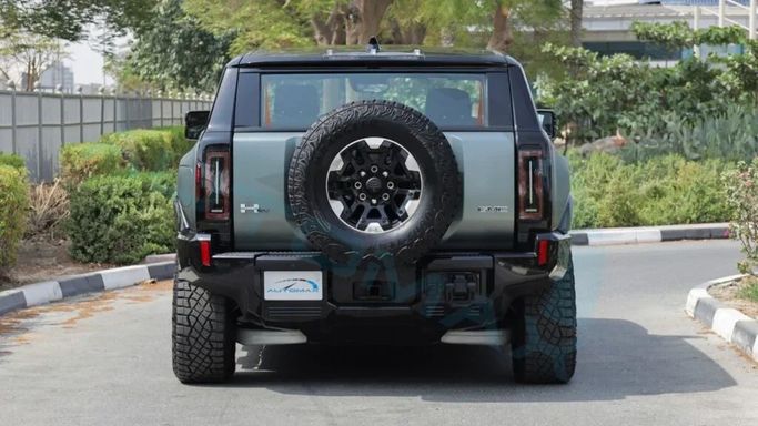 New GMC Hummer EV, 2024 in Dubai by Auto Max Group, Green color.  | AUTO.AE
