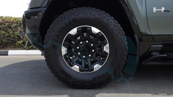 New GMC Hummer EV, 2024 in Dubai by Auto Max Group, Green color.  | AUTO.AE