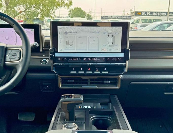 New GMC Hummer EV, 2024 in Dubai by SK Motors, Green color. American Specs | AUTO.AE