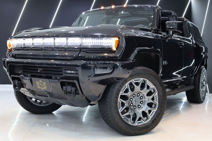 Used GMC Hummer EV, 2024 in Dubai by Sanam Cars, Black color. GCC Specs | AUTO.AE