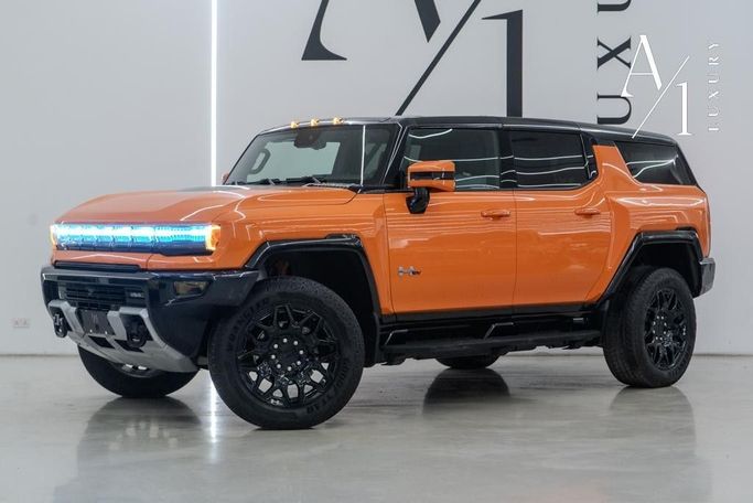 Подержанный GMC Hummer EV, 2024 в Дубае от A1 Luxury Motors Оранжевый цвет. Американская | AUTO.AE
