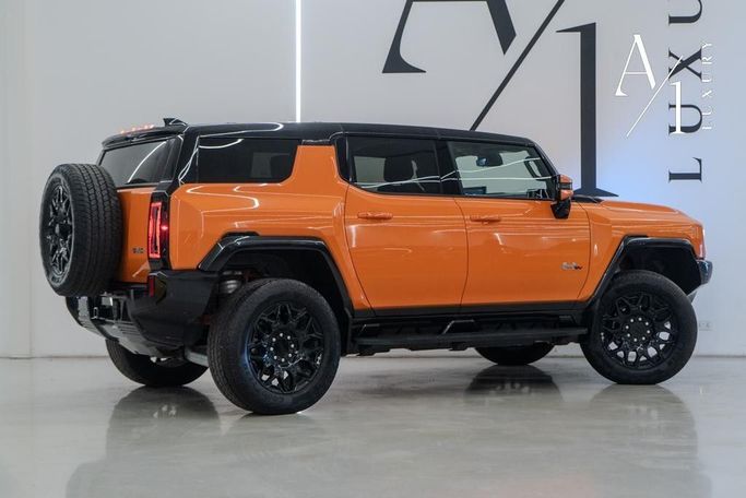 Подержанный GMC Hummer EV, 2024 в Дубае от A1 Luxury Motors Оранжевый цвет. Американская | AUTO.AE