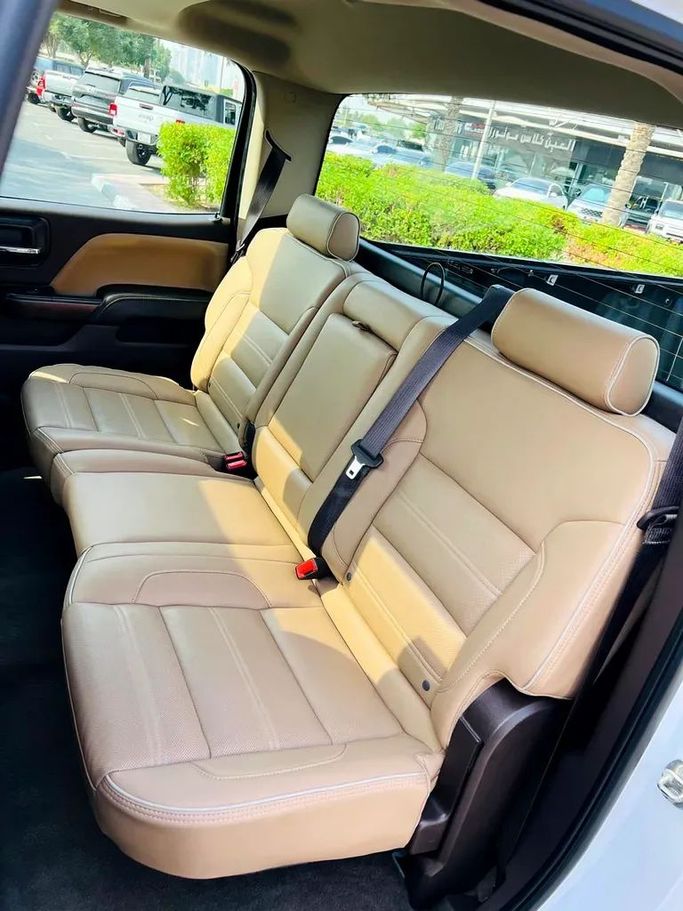 Used GMC Sierra IV, 6.2 l, 2018 in Dubai by First Choice Motors, White color. GCC Specs | AUTO.AE