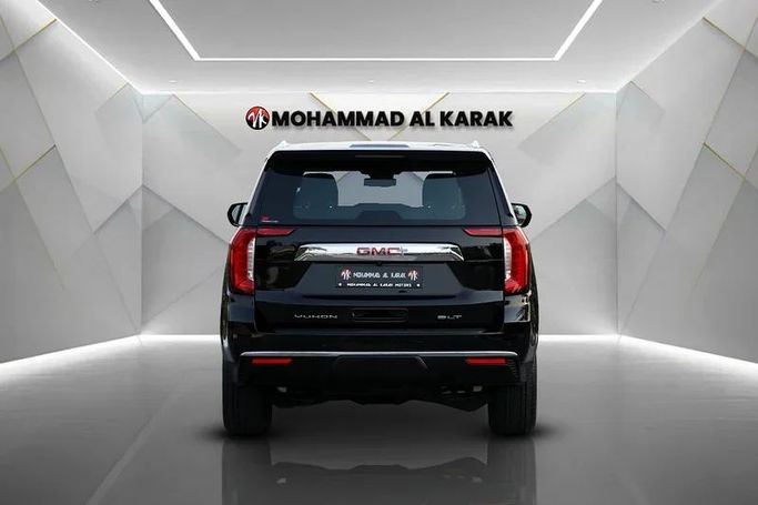 Used GMC Yukon V, 5.3 l, 2023 in Dubai by Mohammad Alkarak Motors, Black color. GCC Specs | AUTO.AE