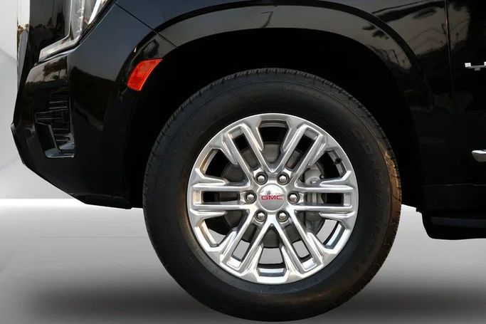 Used GMC Yukon V, 5.3 l, 2023 in Dubai by Mohammad Alkarak Motors, Black color. GCC Specs | AUTO.AE
