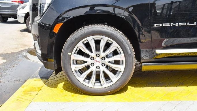 New GMC Yukon V, 6.2 l, 2023 in Dubai by Najem Motors, Black color. GCC Specs | AUTO.AE