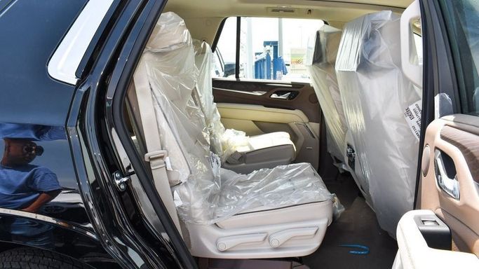 New GMC Yukon V, 6.2 l, 2023 in Dubai by Najem Motors, Black color. GCC Specs | AUTO.AE