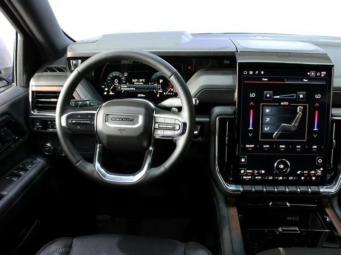 Подержанный GMC Yukon V Рестайлинг, 6.2 л, 2025 в Дубае от Hot Wheel Used Motors Серый цвет. Other | AUTO.AE