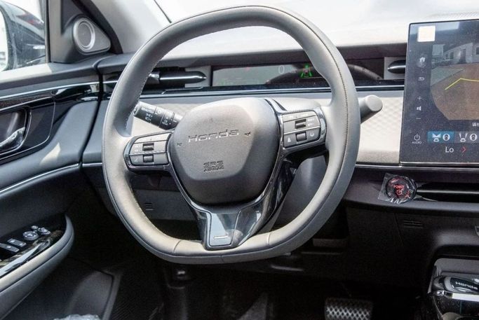 New Honda e:NP1, 2025 in Dubai by Albustanji Motors FZCO, Silver color.  | AUTO.AE