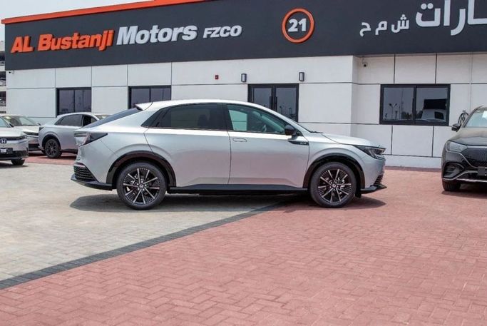 New Honda e:NP1, 2025 in Dubai by Albustanji Motors FZCO, Silver color.  | AUTO.AE