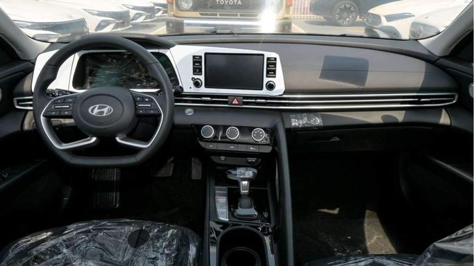 New Hyundai Elantra VII (CN7) Facelift, 1.6 l, 2024 in Dubai by F7 Motors, White color. Chinese Specs | AUTO.AE