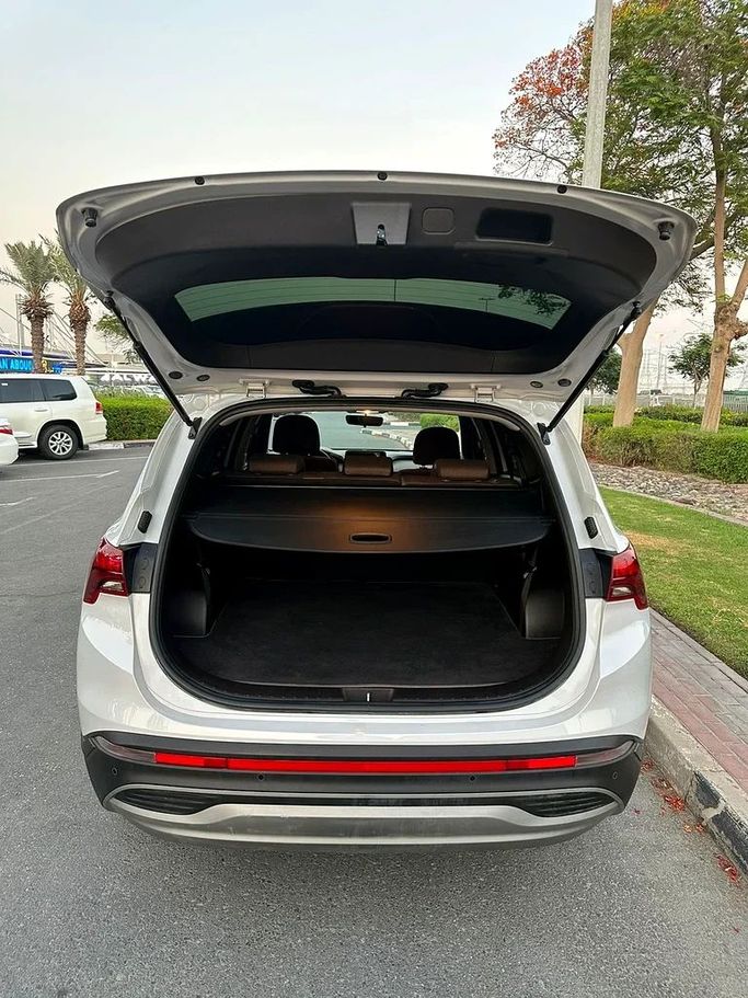 Used Hyundai Santa Fe IV, 2.4 l, 2021 in Dubai by First Choice Motors, White color. GCC Specs | AUTO.AE