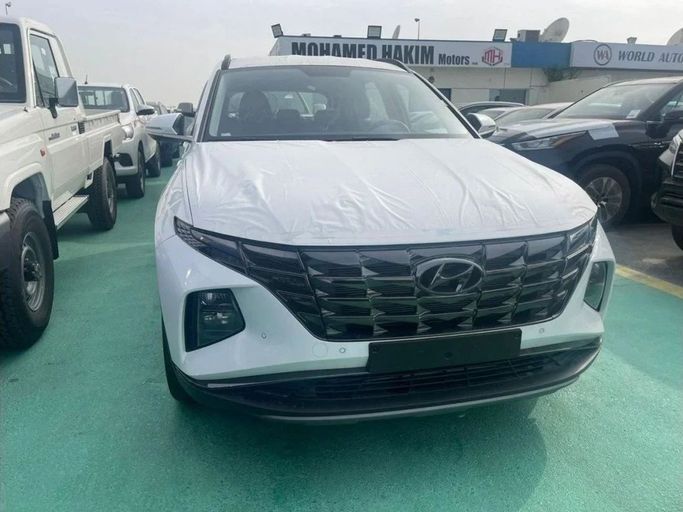 Новый Hyundai Tucson IV Рестайлинг, 2.0 л, 2023 в Дубае от Mohamed Hakim Motors Белый цвет. GCC | AUTO.AE