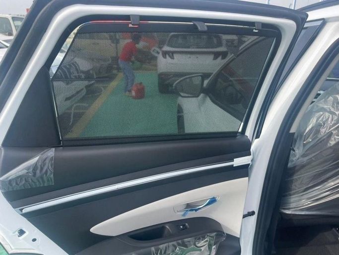 Новый Hyundai Tucson IV Рестайлинг, 2.0 л, 2023 в Дубае от Mohamed Hakim Motors Белый цвет. GCC | AUTO.AE