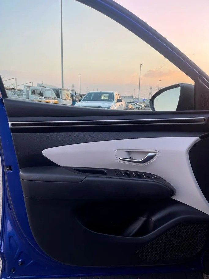 Подержанный Hyundai Tucson IV, 2.5 л, 2022 в Дубае от Shalimar Синий цвет. Американская | AUTO.AE