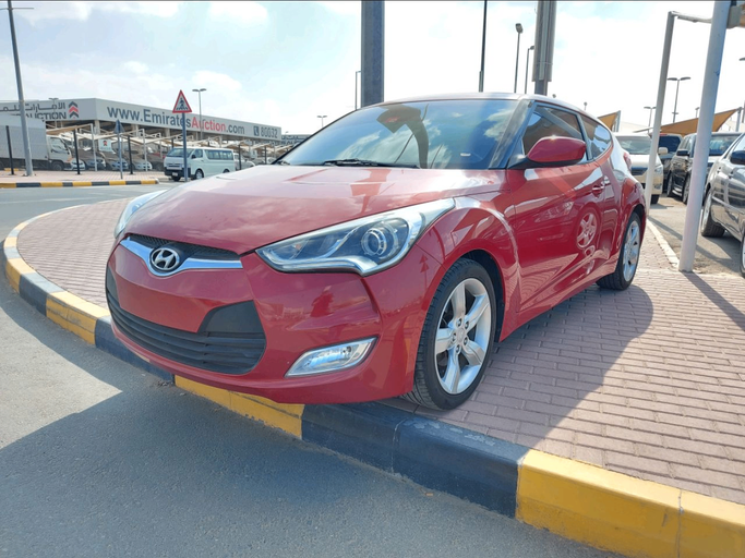 Подержанный Hyundai Veloster I, 1.6 л, 2013 в Дубае от Abdo Al Muthanna Used Cars Красный цвет. GCC | AUTO.AE