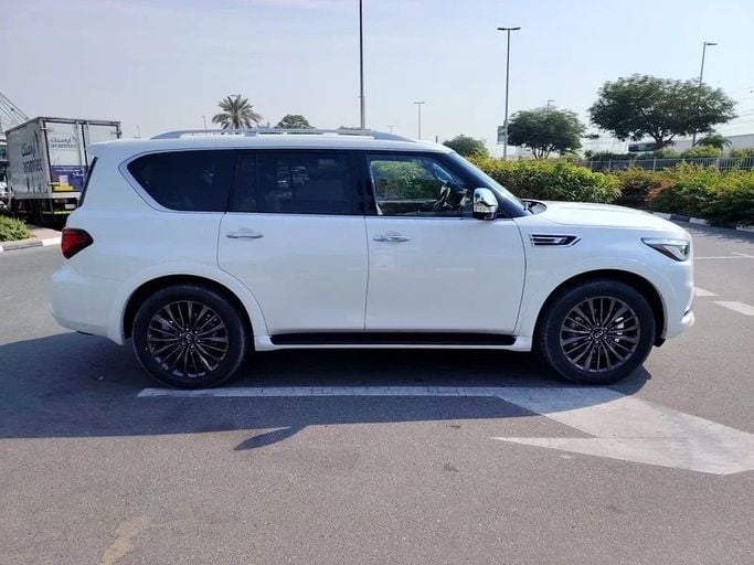 Новый Infiniti QX80 I Рестайлинг 3, 5.6 л, 2023 в Дубае от Great West East Auto Белый цвет. Американская | AUTO.AE