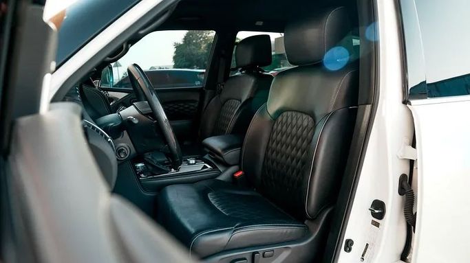 Подержанный Infiniti QX80 I Рестайлинг 3, 5.6 л, 2022 в Дубае от 8 Ba Motors Белый цвет. Канадская | AUTO.AE