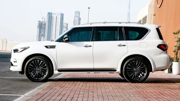 Подержанный Infiniti QX80 I Рестайлинг 3, 5.6 л, 2022 в Дубае от 8 Ba Motors Белый цвет. Канадская | AUTO.AE