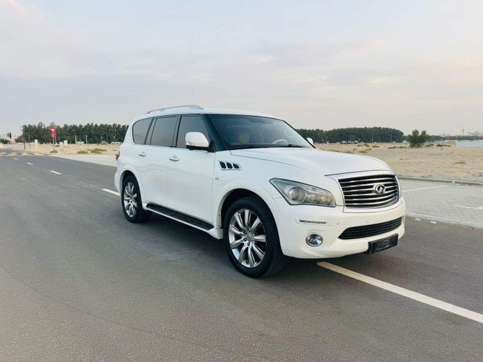 Подержанный Infiniti QX80 I, 5.6 л, 2014 в Дубае от Al Balora Al Bayda Used Cars Белый цвет. Other | AUTO.AE