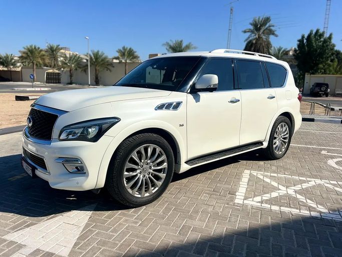 Подержанный Infiniti QX80 I Рестайлинг, 5.6 л, 2016 в Дубае от Hashem Used Cars Белый цвет. GCC | AUTO.AE