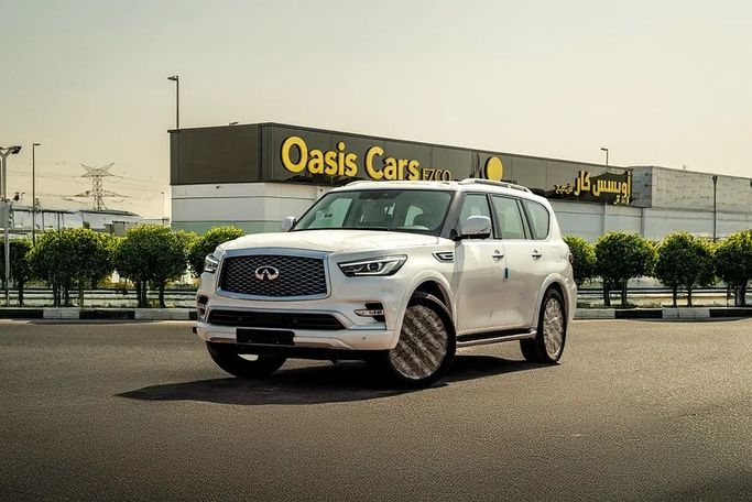 New ⁦Infiniti QX80 I (Z62) Facelift 3, 5.6 l, 2024⁩ in UAE, Dubai by OASIS CARS, White color. GCC Specs | AUTO.AE | Listing #286895