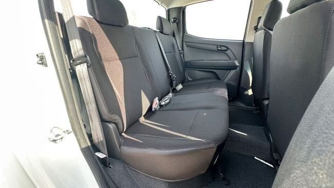 New Isuzu D-Max III, 2.5 l, 2025 in Dubai by Falcons GT Motors FZCO, White color. European Specs | AUTO.AE