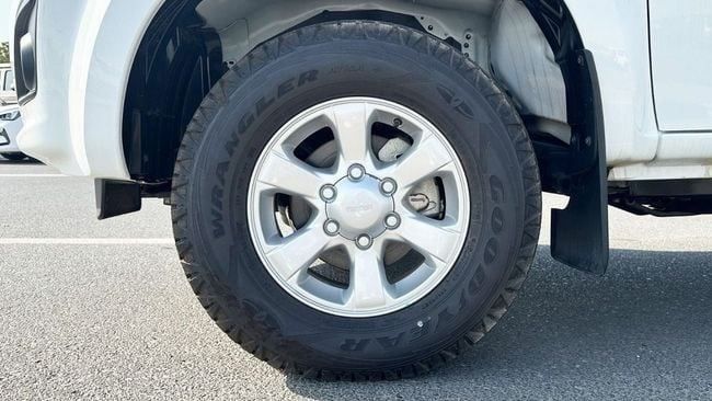 New Isuzu D-Max III, 2.5 l, 2025 in Dubai by Falcons GT Motors FZCO, White color. European Specs | AUTO.AE