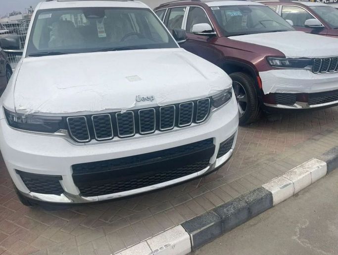 New Jeep Grand Cherokee L V (WL), 3.6 l, 2023 in Dubai by Mohamed Hakim Motors, White color. GCC Specs | AUTO.AE