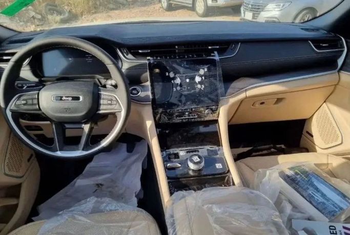 New Jeep Grand Cherokee L V (WL), 3.6 l, 2023 in Dubai by Mohamed Hakim Motors, White color. GCC Specs | AUTO.AE