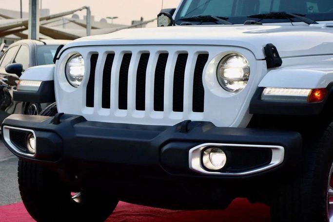 Подержанный Jeep Wrangler IV (JL), 3.6 л, 2019 в Дубае от Dresden Motors Белый цвет. GCC | AUTO.AE
