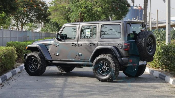 New Jeep Wrangler IV (JL) Facelift, 2.0 l, 2025 in Dubai by Auto Max Group, Grey color. GCC Specs | AUTO.AE