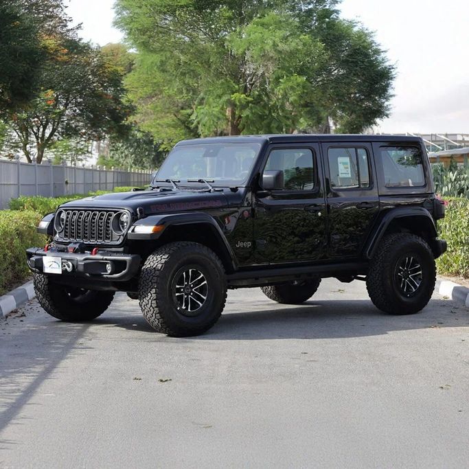 New Jeep Wrangler IV (JL) Facelift, 2.0 l, 2025 in Dubai by Auto Max Group, Black color. GCC Specs | AUTO.AE