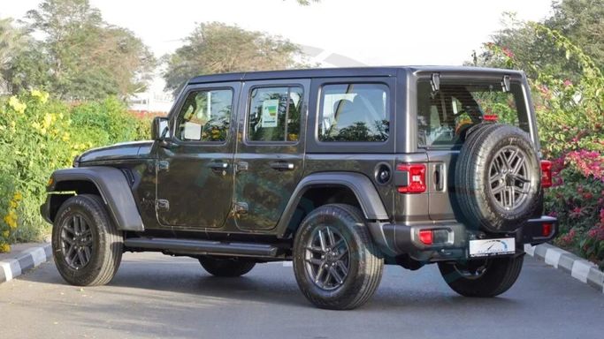 New Jeep Wrangler IV (JL) Facelift, 2.0 l, 2025 in Dubai by Auto Max Group, Silver color. GCC Specs | AUTO.AE