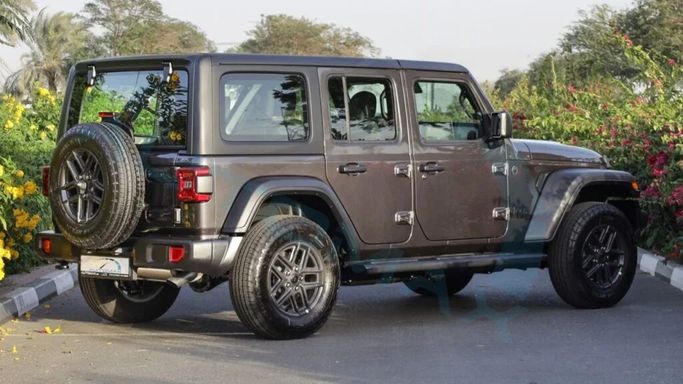 New Jeep Wrangler IV (JL) Facelift, 2.0 l, 2025 in Dubai by Auto Max Group, Silver color. GCC Specs | AUTO.AE