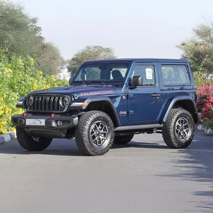 New Jeep Wrangler IV (JL) Facelift, 2.0 l, 2025 in Dubai by Auto Max Group, Light Blue color. GCC Specs | AUTO.AE