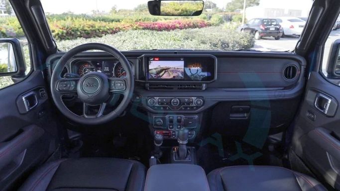 New Jeep Wrangler IV (JL) Facelift, 2.0 l, 2025 in Dubai by Auto Max Group, Light Blue color. GCC Specs | AUTO.AE