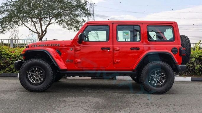 New Jeep Wrangler IV (JL) Facelift, 6.4 l, 2024 in Dubai by Auto Max Group, Red color. GCC Specs | AUTO.AE