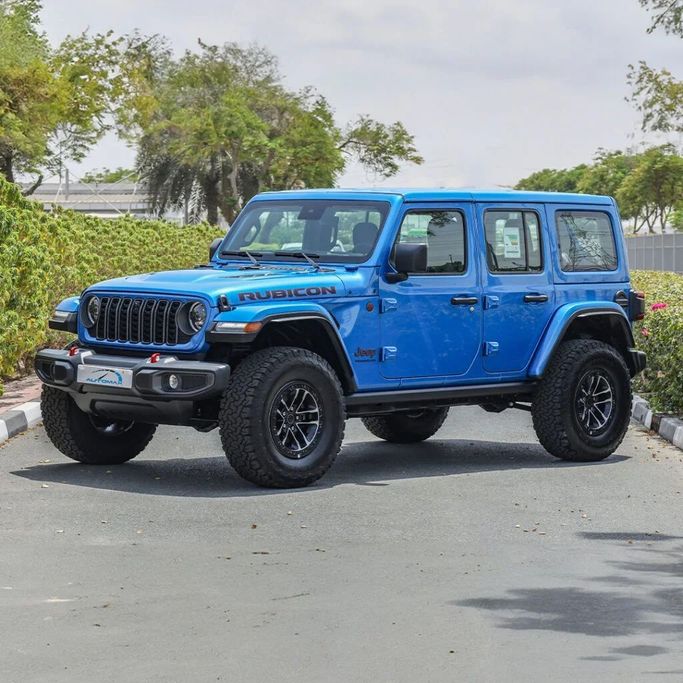 Новый Jeep Wrangler IV (JL) Рестайлинг, 2.0 л, 2024 в Дубае от Auto Max Group Голубой цвет. GCC | AUTO.AE