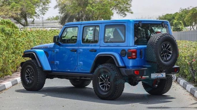 Новый Jeep Wrangler IV (JL) Рестайлинг, 2.0 л, 2024 в Дубае от Auto Max Group Голубой цвет. GCC | AUTO.AE