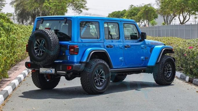 Новый Jeep Wrangler IV (JL) Рестайлинг, 2.0 л, 2024 в Дубае от Auto Max Group Голубой цвет. GCC | AUTO.AE