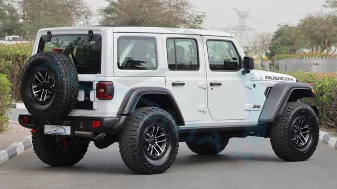 Новый Jeep Wrangler IV (JL) Рестайлинг, 2.0 л, 2024 в Дубае от Auto Max Group Белый цвет. GCC | AUTO.AE