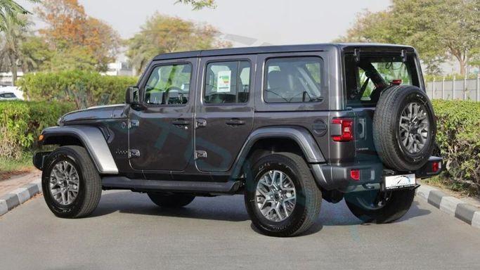 New Jeep Wrangler IV (JL) Facelift, 2.0 l, 2025 in Dubai by Auto Max Group, Black color. GCC Specs | AUTO.AE