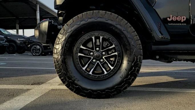 New Jeep Wrangler IV (JL) Facelift, 2.0 l, 2024 in Dubai by Auto Max Group, Black color. GCC Specs | AUTO.AE